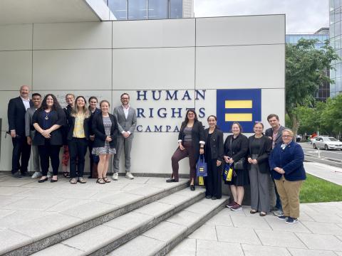 Students standing outside the offices of the Human Rights Campaign. 