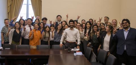 Students standing with U.S. Representative Greg Casar