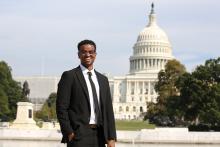 man standing with US Capitol in the background