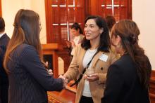 two women shaking hands