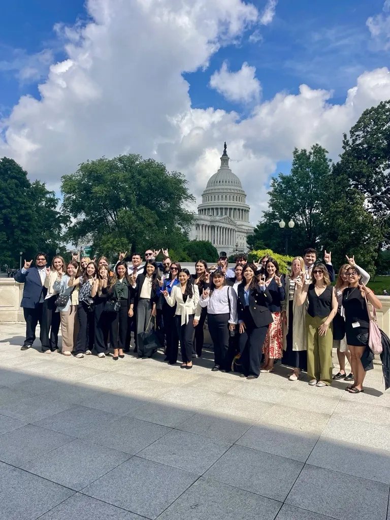 Students standing outside of the Capitol