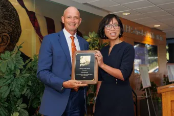 Dean and Alumna strike a pose with the LBJ Award 