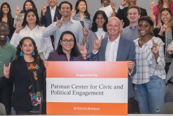 group photo with Patman center sign front and center
