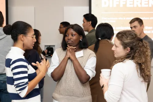 Students in a group discussing the topic of the training.