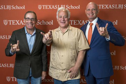 Austin mayor Kirk Watson poses with Dean JR DeShazo and Evan Smith.